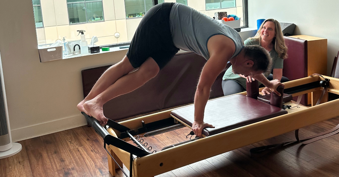 Graham reformer twist Pilates reformer exercise