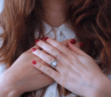 Reduce mental load by practicing self-compassion. Woman with hands over heart